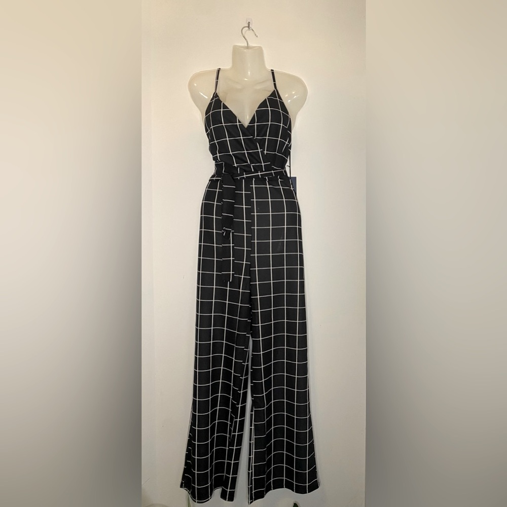 Bottom sharp black & white  plunge v-neck, open back women’s L Jumpsuit.